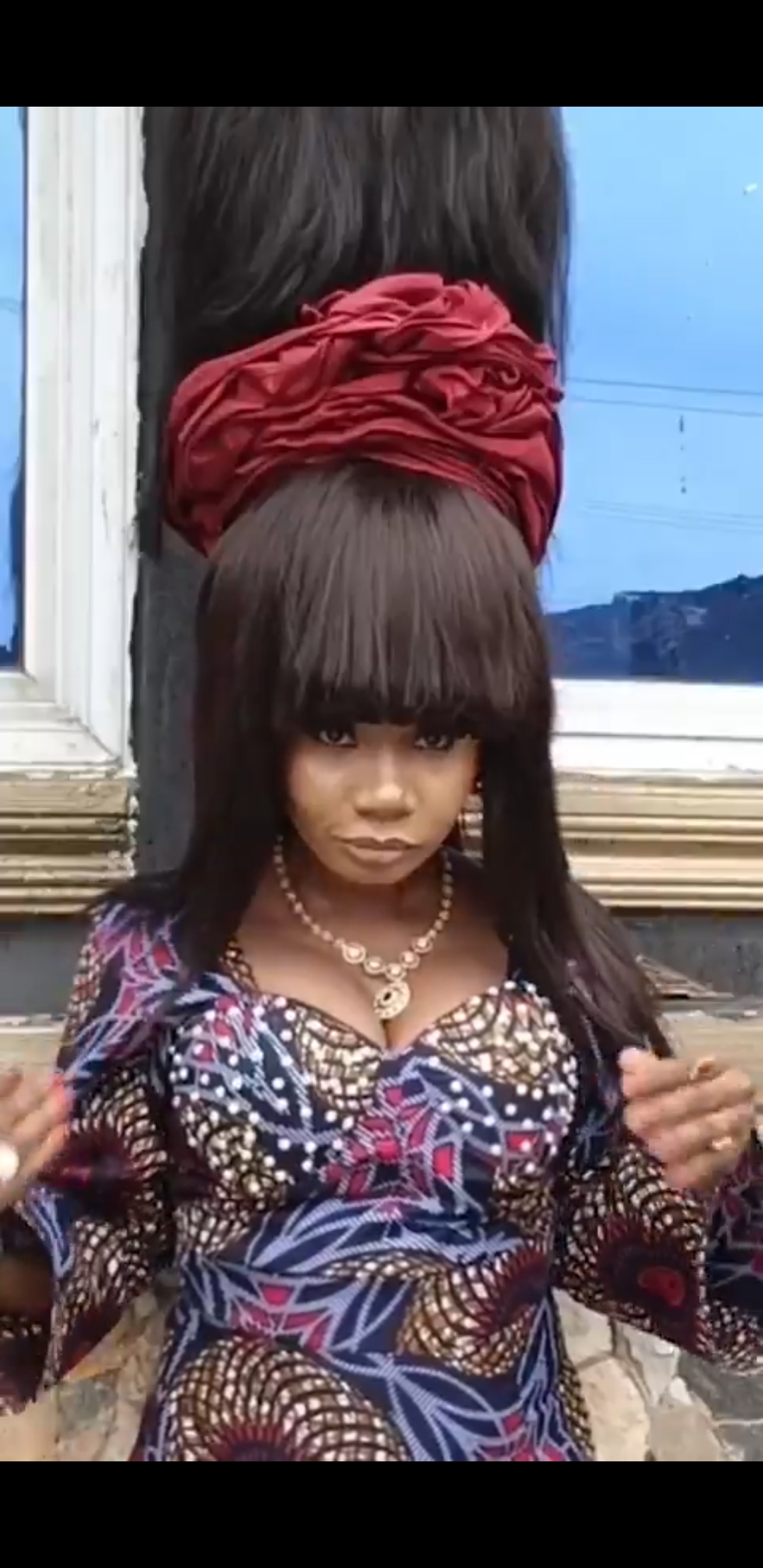 busterblog - “Nigeria’s Rapunzel Does It Again”: Helen Williams Smashes Guinness World Record With 15.37-Meter Wig in Lagos