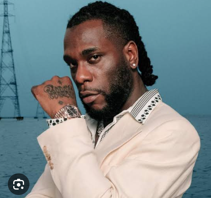 busterblog - “I Don Pay Their School Fees!” — Burna Boy Reacts as Excited Fans Swarm His McLaren Senna in Lagos Streets