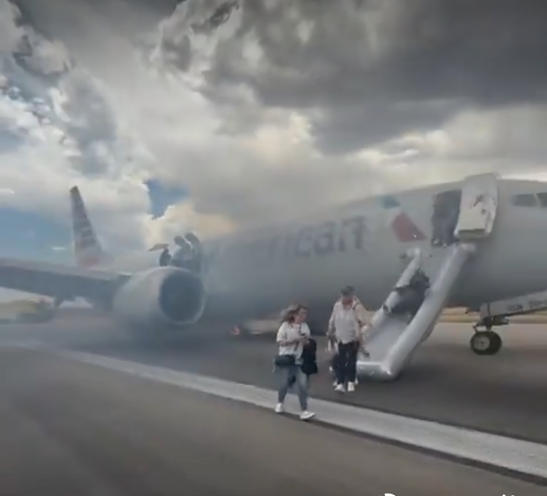 Panic in the Skies: American Airlines Flight Erupts in Fire at Denver Airport, Passengers Evacuate via Slides