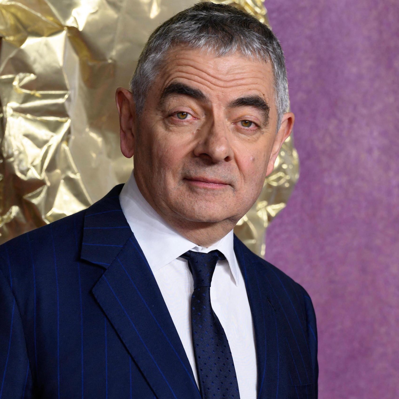 Still Making the World Laugh at 71: Rowan Atkinson, the Timeless Genius Behind Mr. Bean, Celebrates Another Year of Comedy Royalty