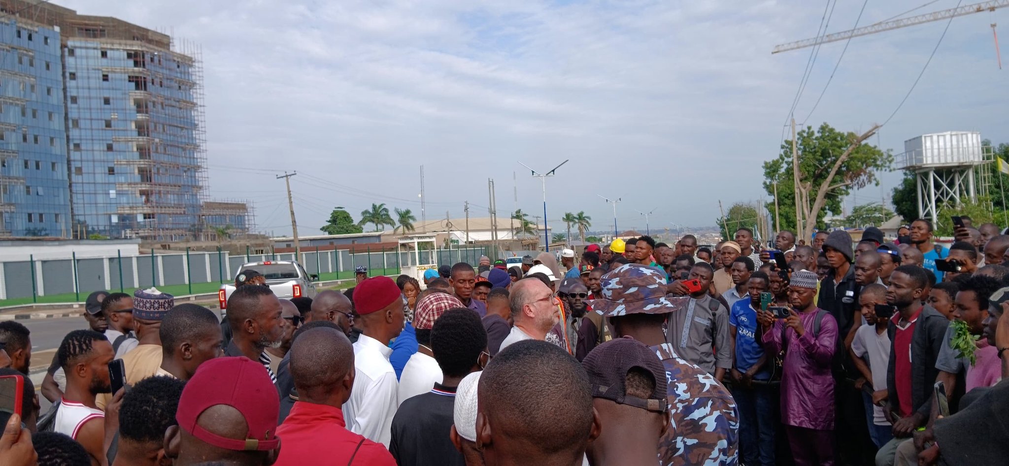 busterblog - Craneburg Workers Protest After Fence Collapse Kills Colleague At Kwara Hotel Site — Third Death In One Week